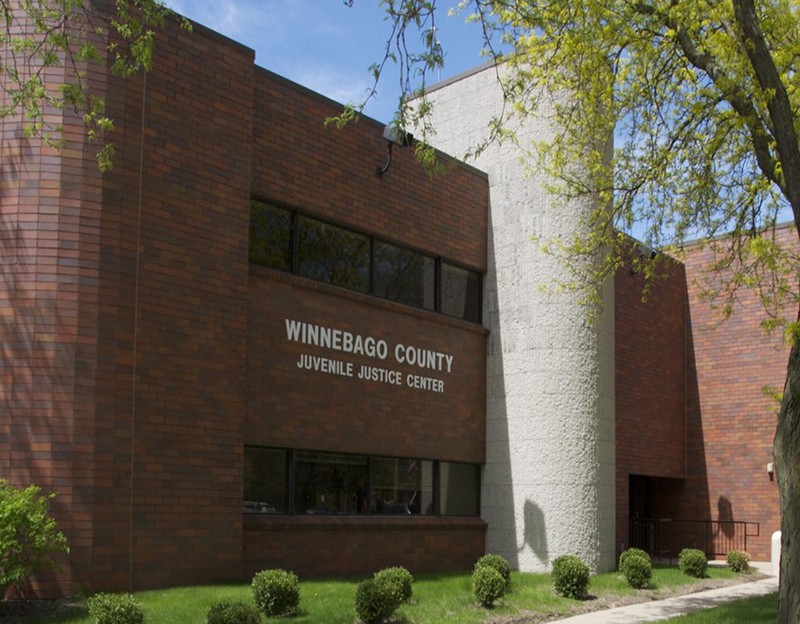 Person at desk on computer